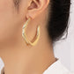 Twisted metal hoop earrings