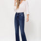 High Rise Distressed Hem Kick Flare Jeans