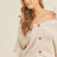 MABLE Off Shoulder Self Tie Strap Button Down Sweater