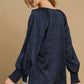 Umgee Wrinkled Round Neck Lantern Sleeve Blouse