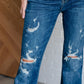 Gabriella Mid Rise Distressed Button Fly Flare Jeans