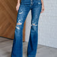 Gabriella Mid Rise Distressed Button Fly Flare Jeans